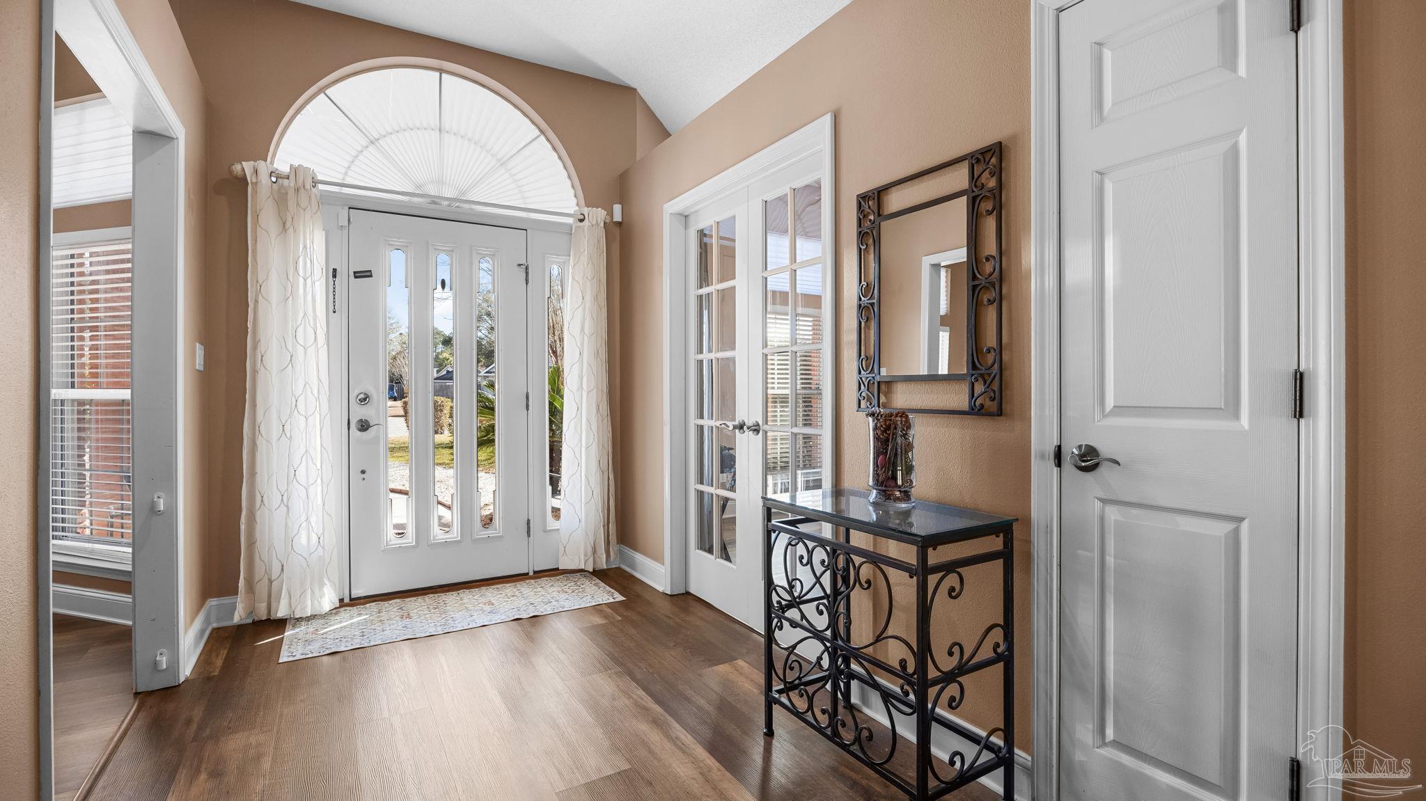 10305 Nightwind Circle Cantonment, FL 32533 - Photo 12 of 46 Light-filled entry with French doors.