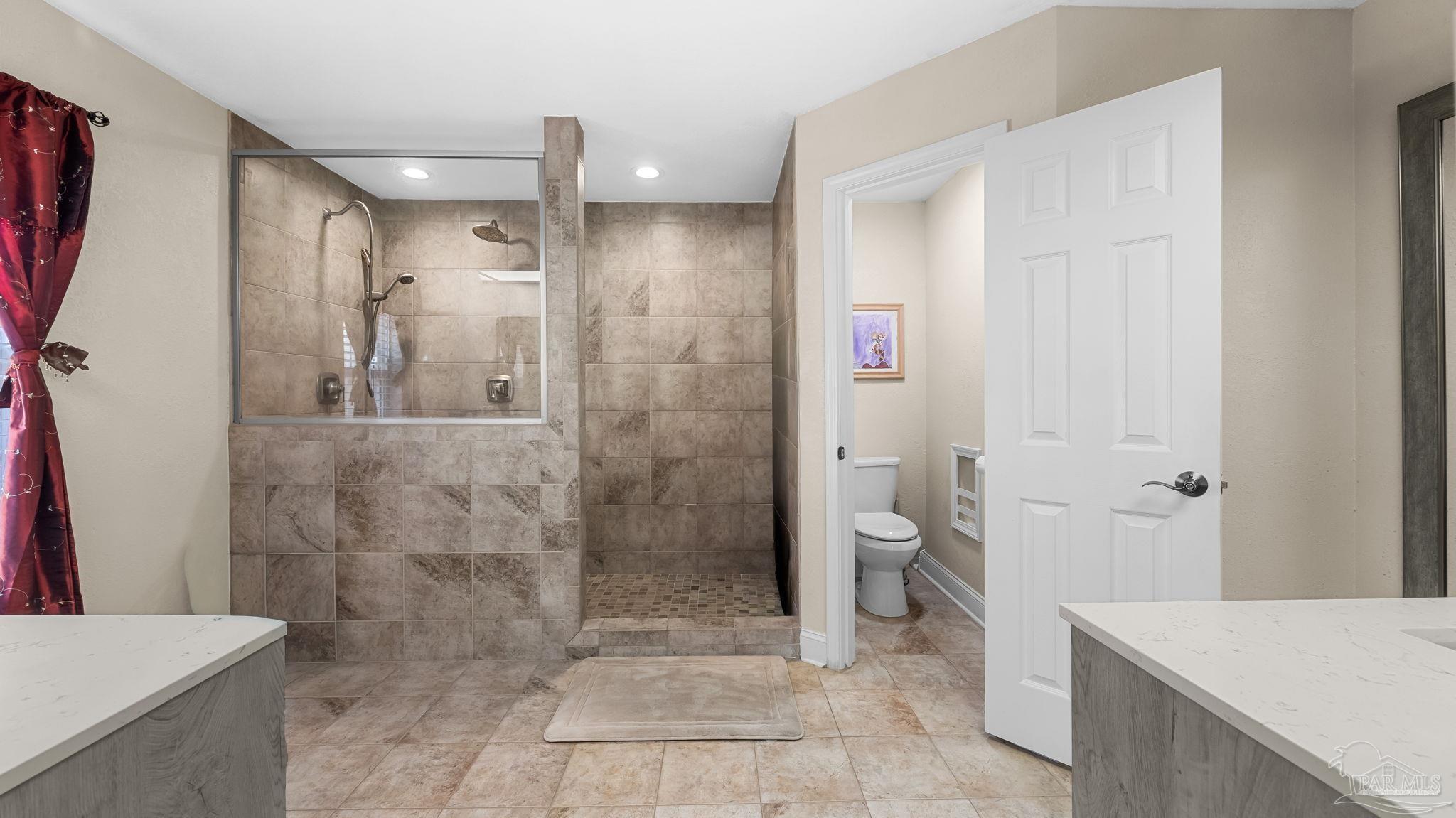 10305 Nightwind Circle Cantonment, FL 32533 - Photo 27 of 46 Spacious layout with private water closet.