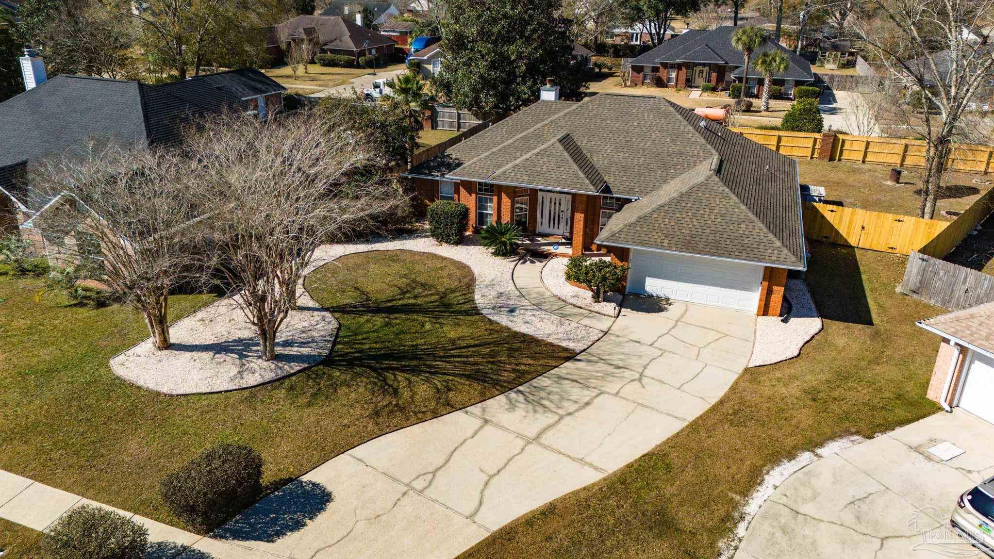 10305 Nightwind Circle Cantonment, FL 32533 - Photo 3 of 46 Aerial view of wide driveway and mature trees.