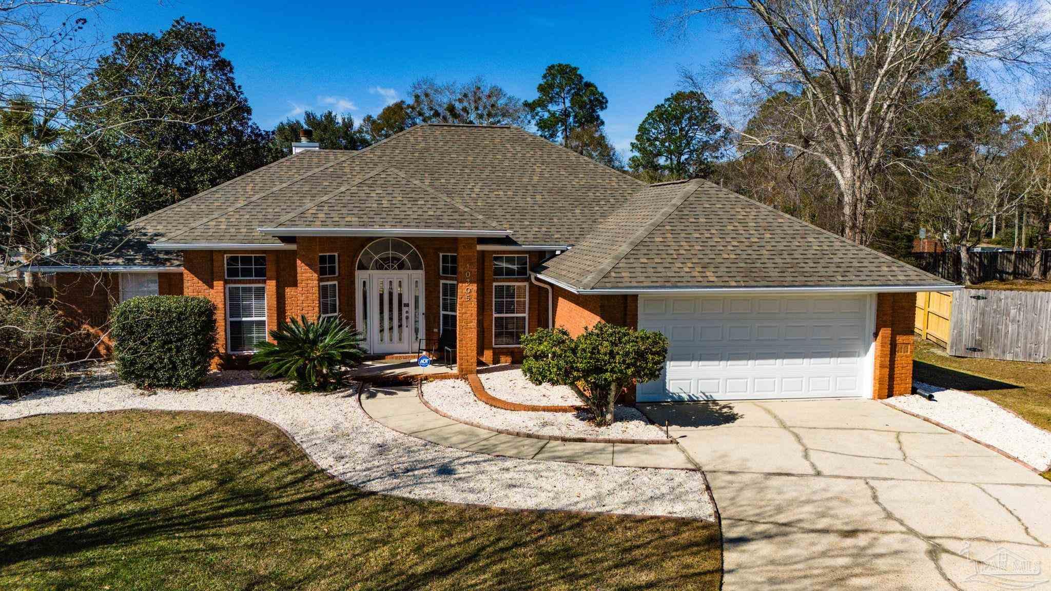 10305 Nightwind Circle Cantonment, FL 32533 - Photo 35 of 46 Arched front entry, low maintenance landscaping.
