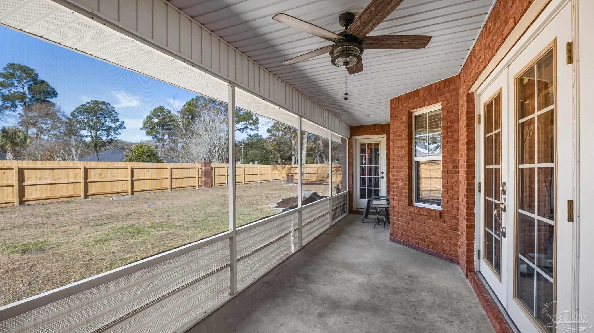 10305 Nightwind Circle Cantonment, FL 32533 - Photo 46 of 46 Spacious screened porch perfect for coffee time.