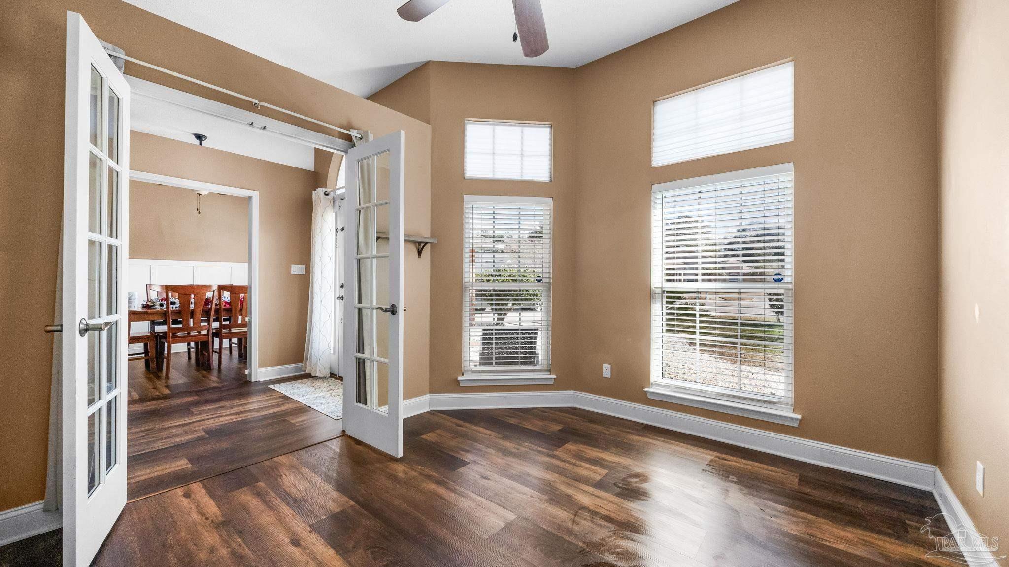 10305 Nightwind Circle Cantonment, FL 32533 - Photo 9 of 46 Bright flex room with French doors and windows.