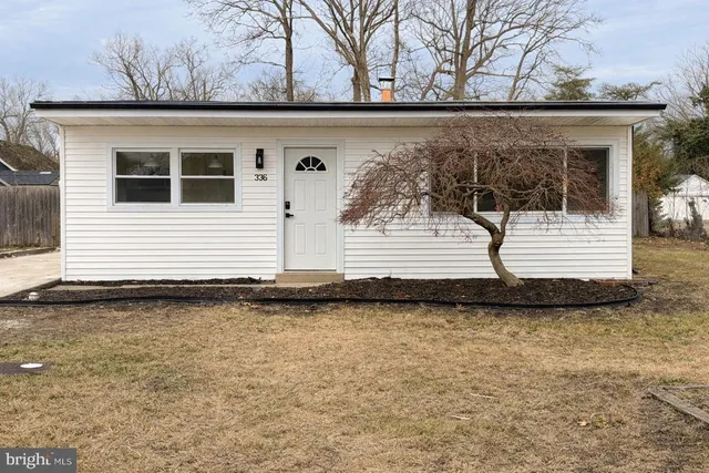a view of a back yard of a house