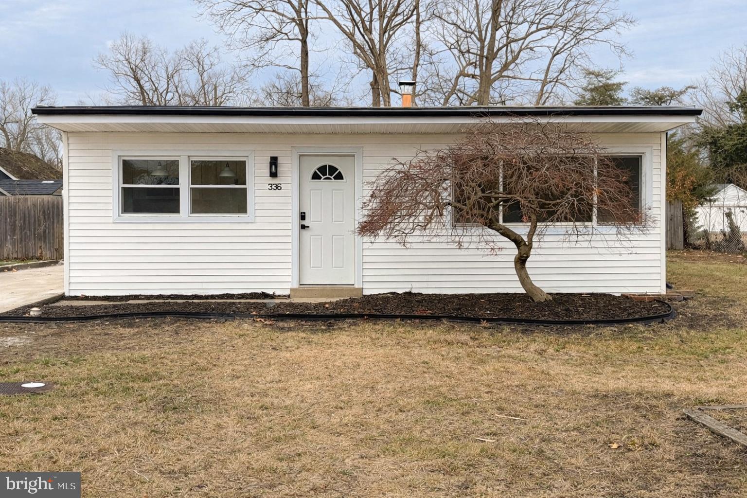 a view of a back yard of a house