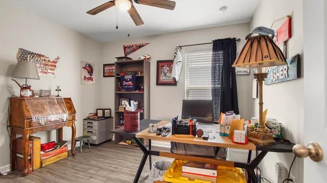 a view of a workspace with furniture