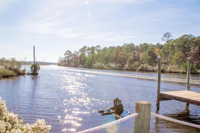 a view of a lake from a yard