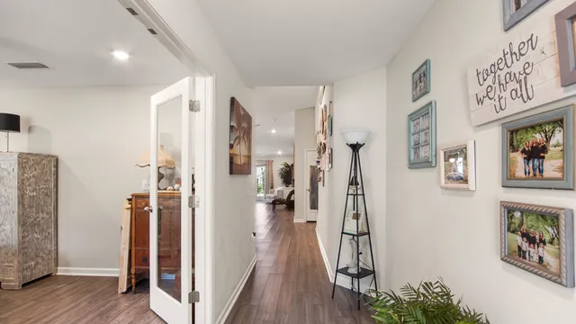 a view of entryway with wooden floor