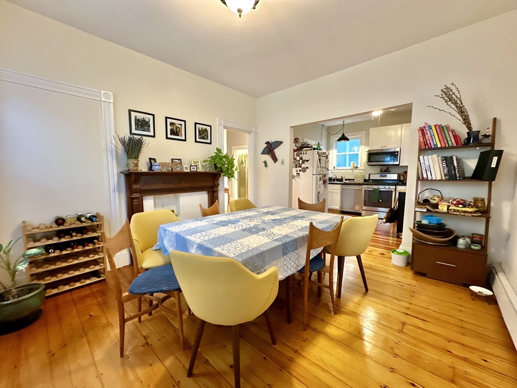 11 Sheridan Street, Unit 2 Boston, MA 02130 - Photo 11 of 17 a living room with furniture and a table