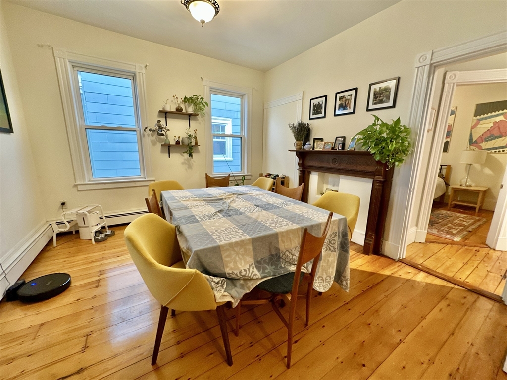 11 Sheridan Street, Unit 2 Boston, MA 02130 - Photo 12 of 17 a view of a dining room with furniture and wooden floor