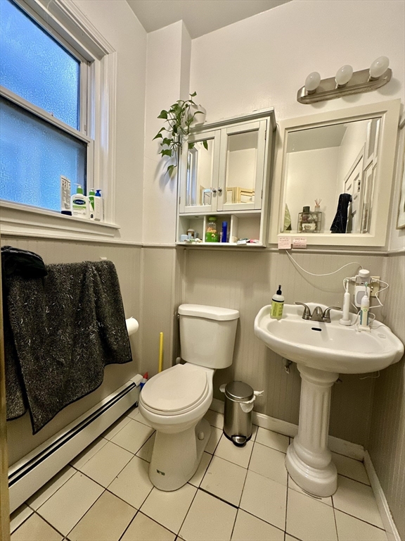11 Sheridan Street, Unit 2 Boston, MA 02130 - Photo 13 of 17 a bathroom with a sink toilet and a mirror