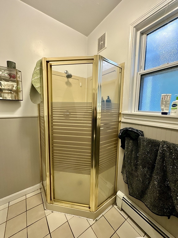 11 Sheridan Street, Unit 2 Boston, MA 02130 - Photo 14 of 17 a view of a bathroom with mirror gate
