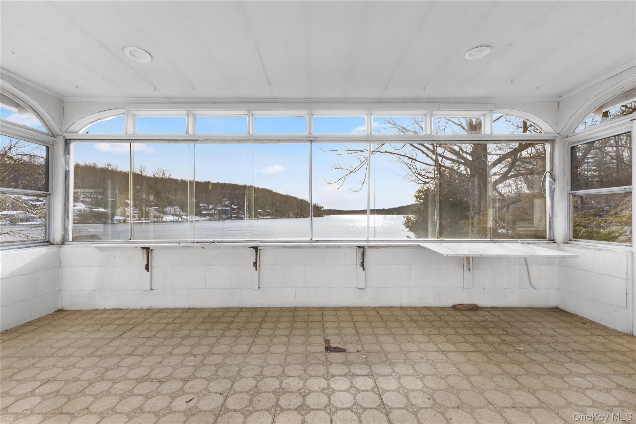 149 North Shore Road Putnam Valley, NY 10579 - Photo 8 of 15 a view of a kitchen with cabinets
