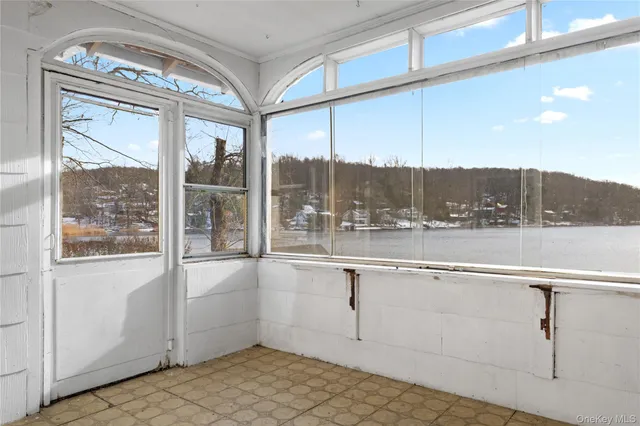 a view of a living room and window