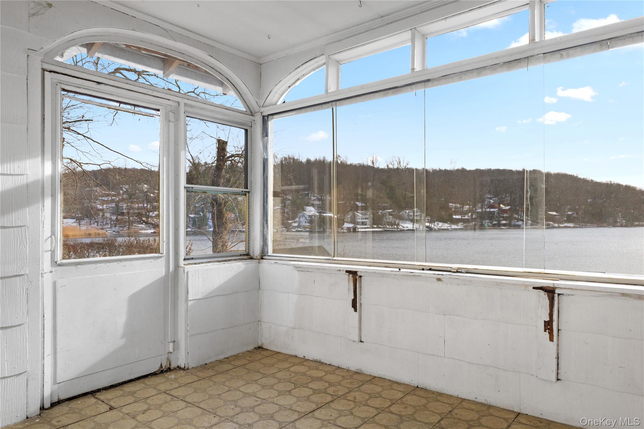 149 North Shore Road Putnam Valley, NY 10579 - Photo 9 of 15 a view of a living room and window