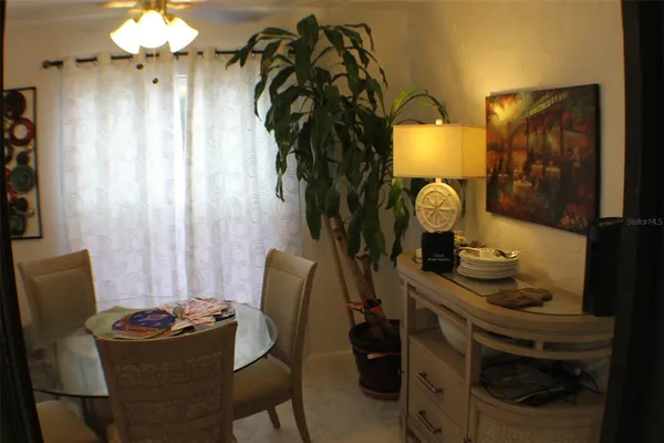 a kitchen with a stove and a microwave