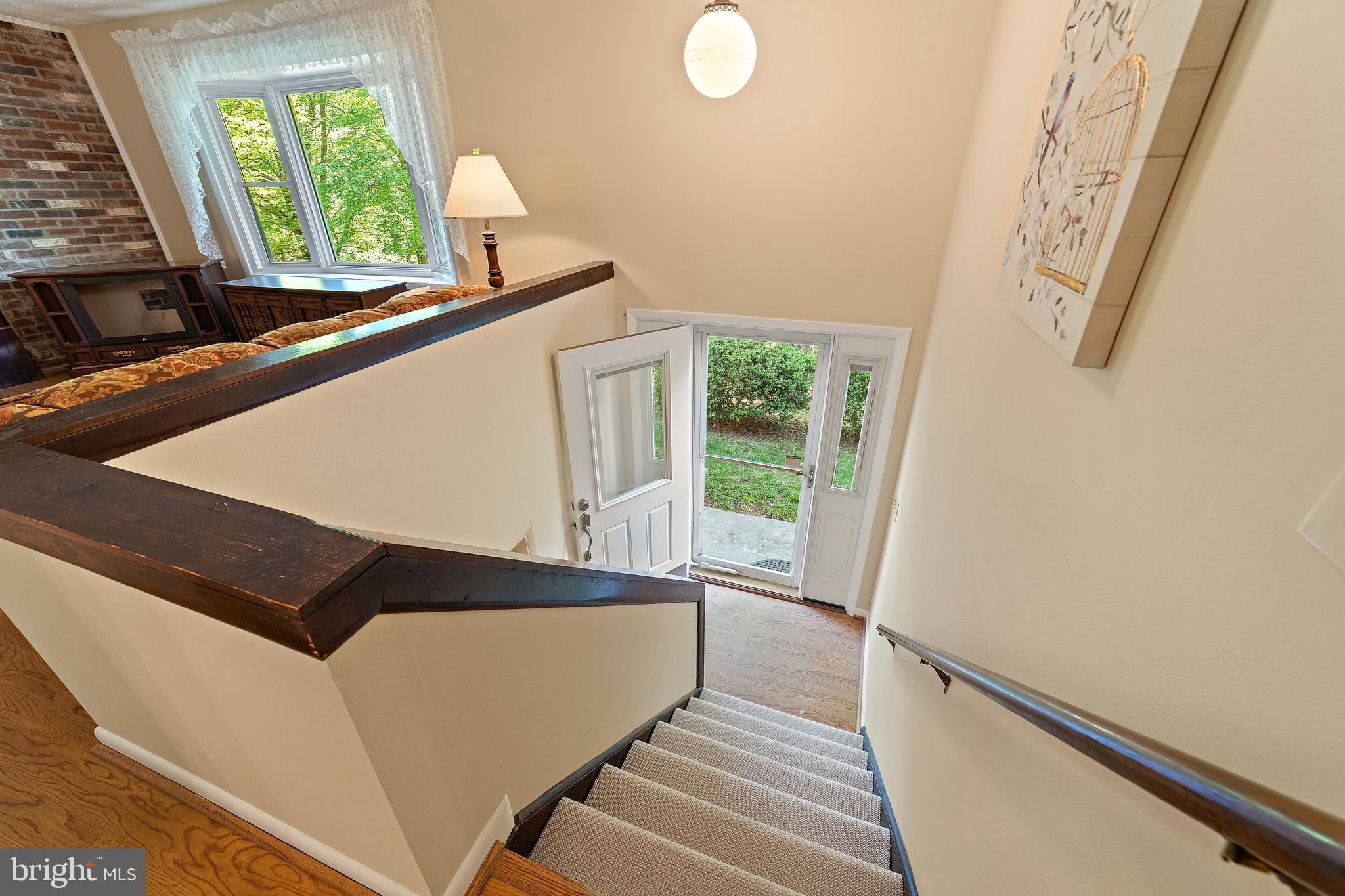 5847 Wilson Road Marshall, VA 20115 - Photo 17 of 55 Staircase to front entry and lower level