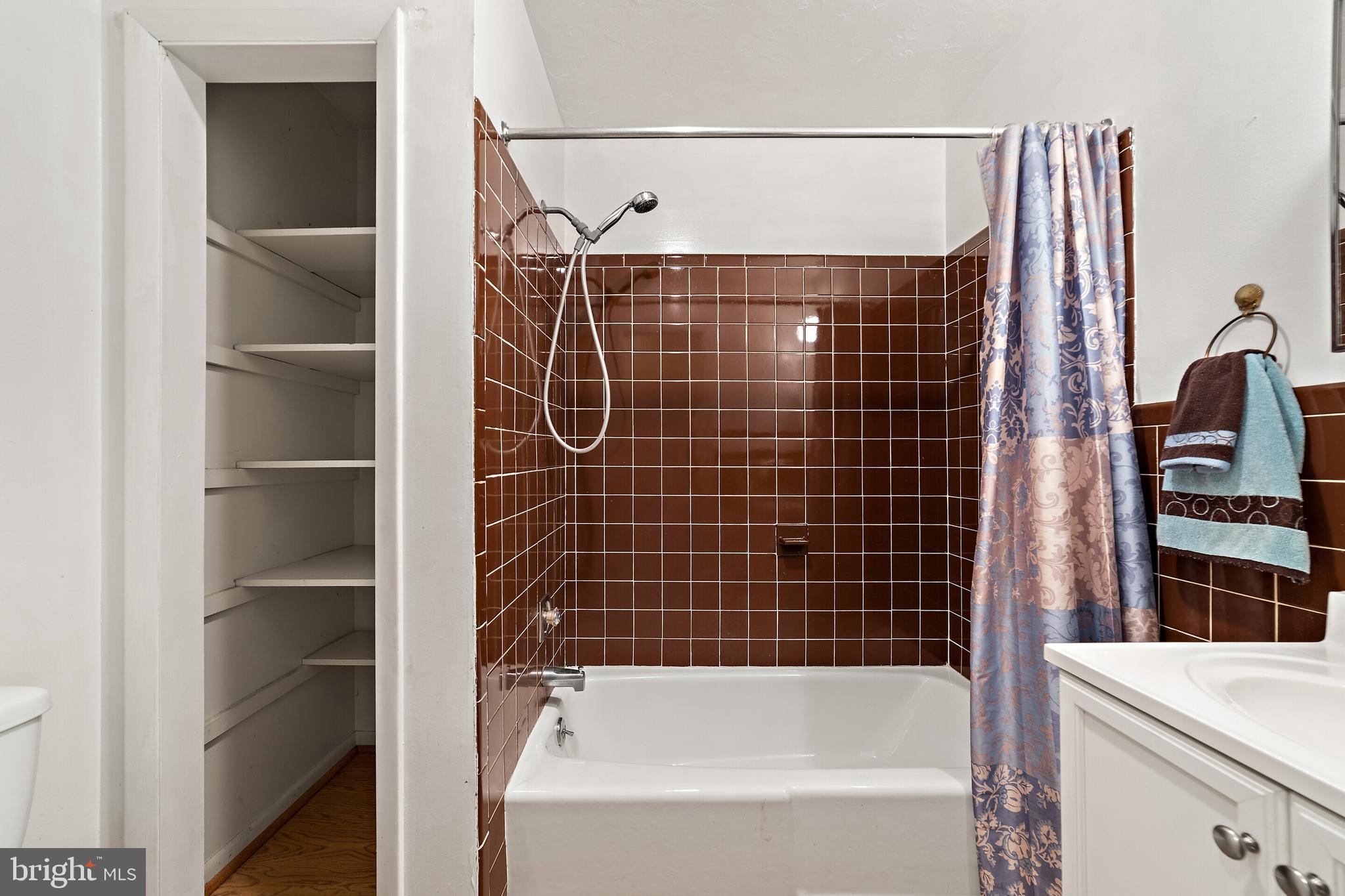 5847 Wilson Road Marshall, VA 20115 - Photo 27 of 55 Shelving in hall bathroom for linens and things