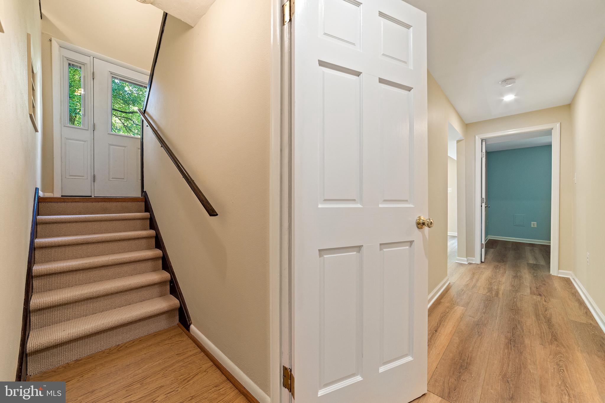 5847 Wilson Road Marshall, VA 20115 - Photo 28 of 55 Staircase to front entry and view of hallway