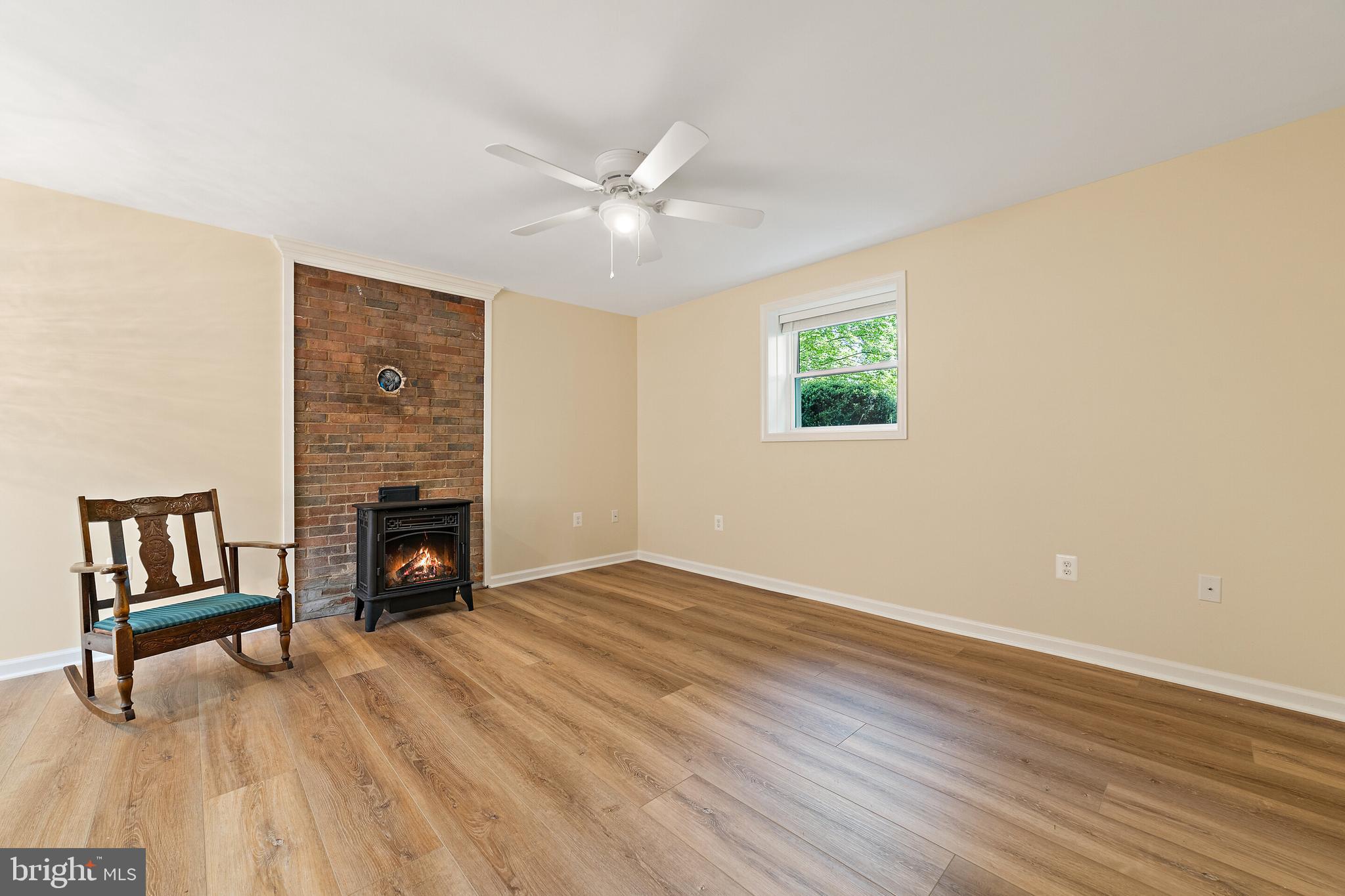 5847 Wilson Road Marshall, VA 20115 - Photo 29 of 55 Family room in lower level with gas-log stove