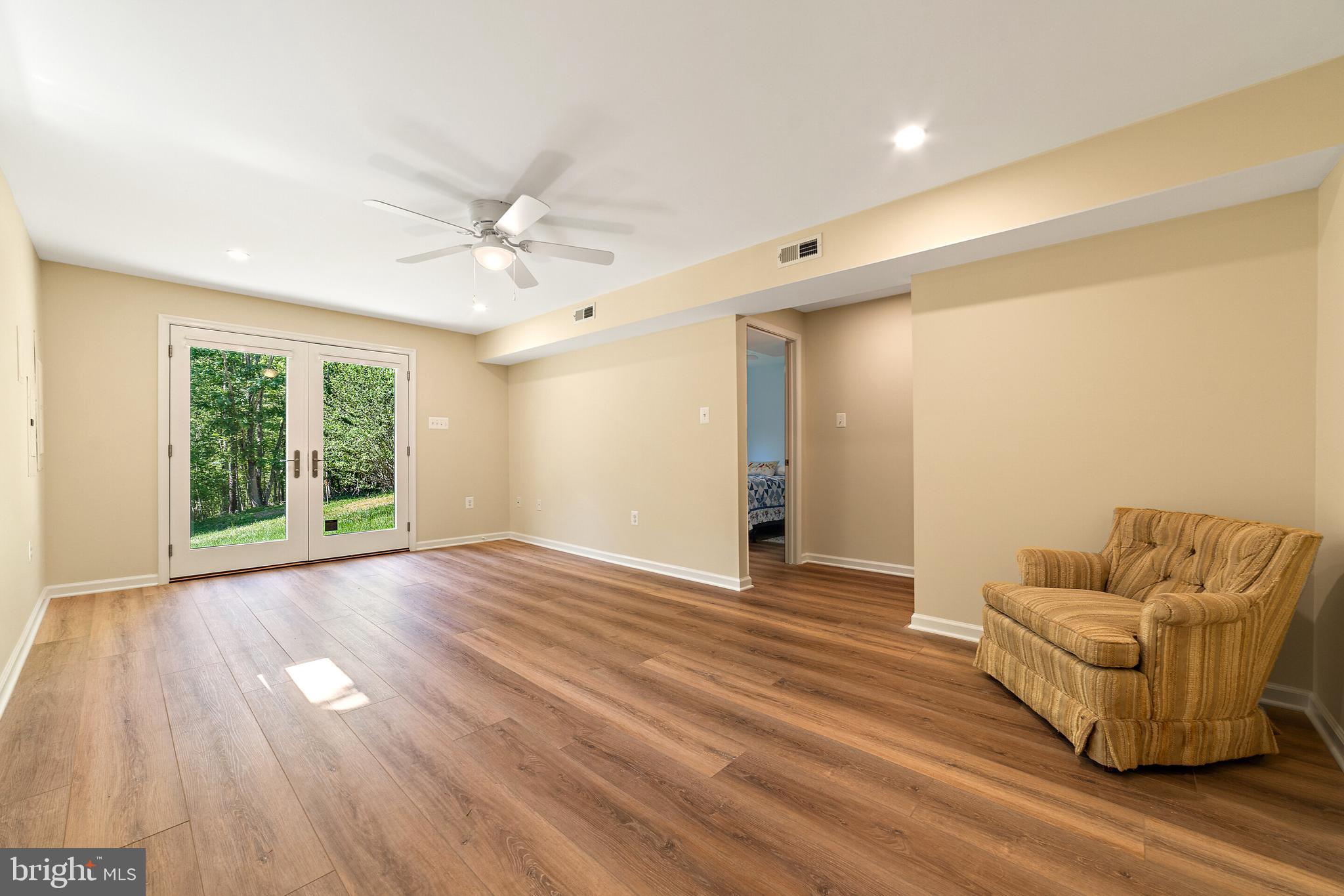 5847 Wilson Road Marshall, VA 20115 - Photo 35 of 55 LVP flooring in recreation room