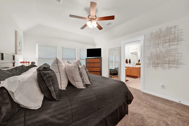 a view of a dining room with furniture and window