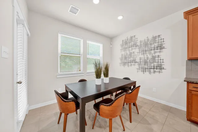 a kitchen with a sink and a stove top oven