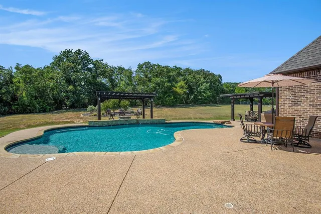 $1,325,000 | 6909 Heritage Oaks Drive, Mansfield, TX 76063