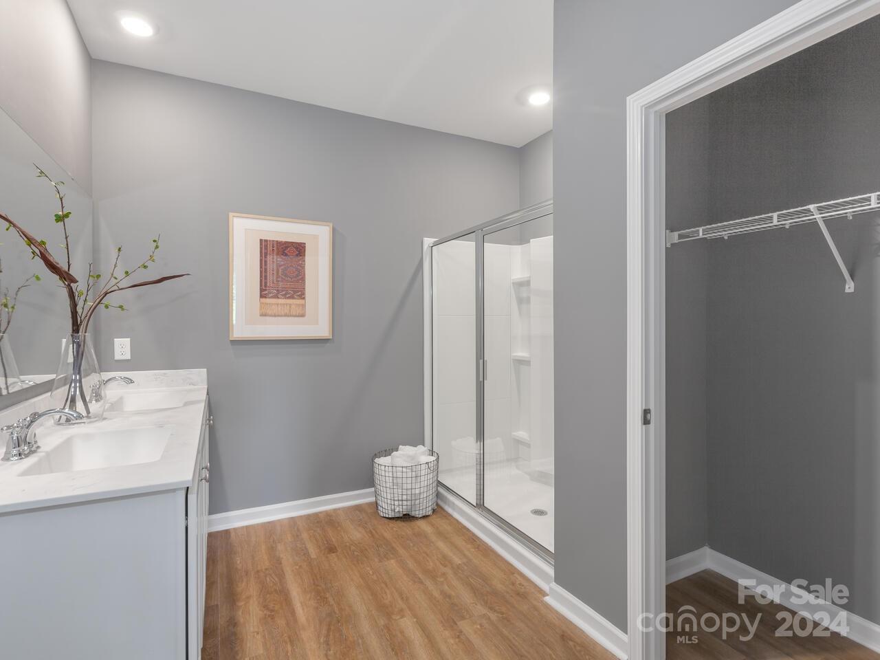 63 Dandelion Road Fletcher, NC 28732 - Photo 20 of 27 a bathroom with a sink and a mirror