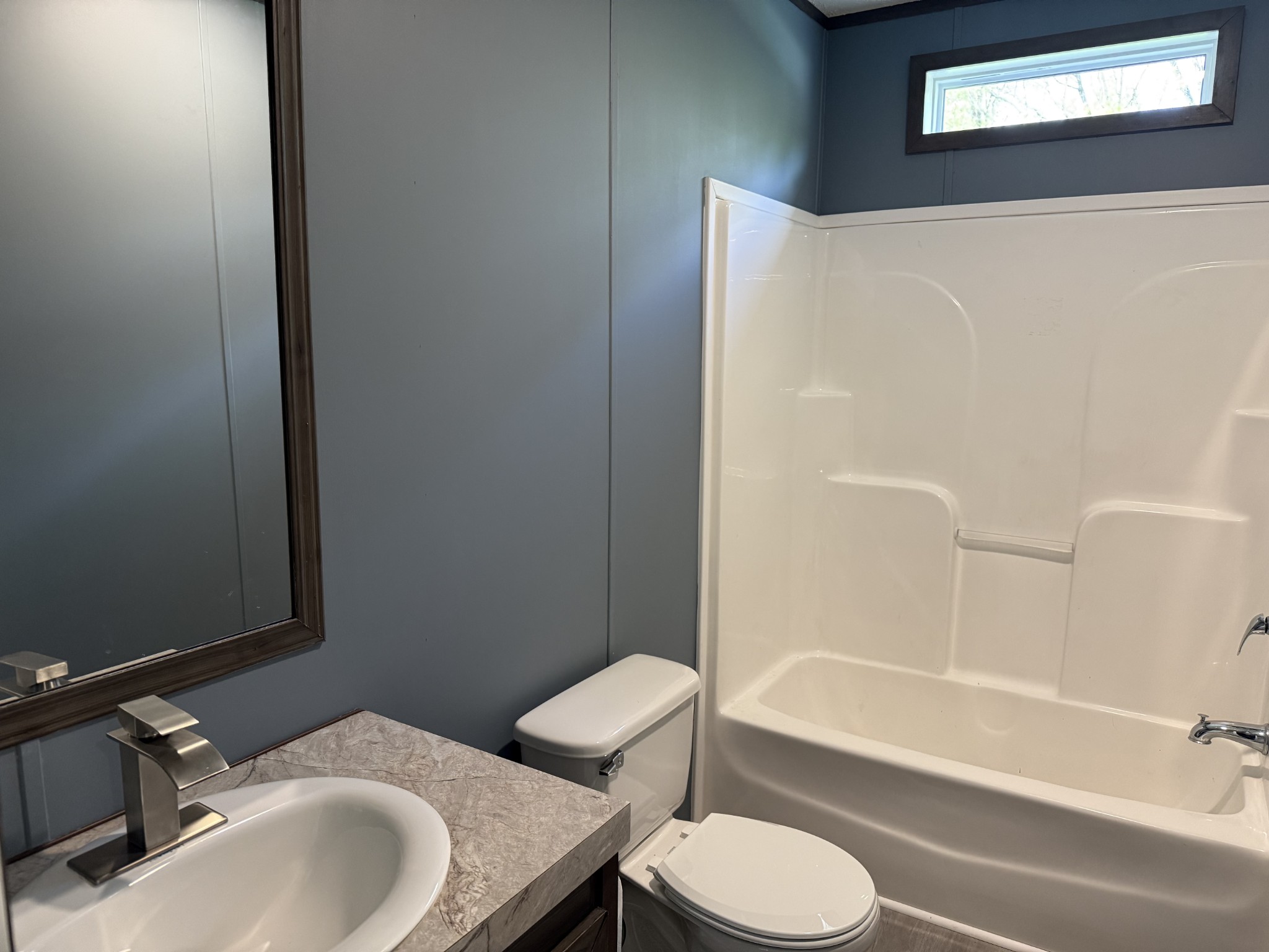 532 Pointe Lane Lafayette, TN 37083 - Photo 8 of 11 a bathroom with a sink toilet and bathtub