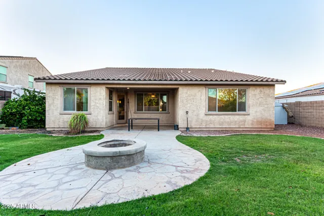 a view of livingroom with furniture and a chandelier