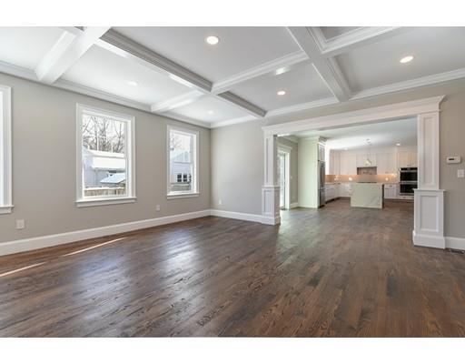 22 Richard Road Needham, MA 02492 - Photo 3 of 30 a view of an empty room with wooden floor and a window