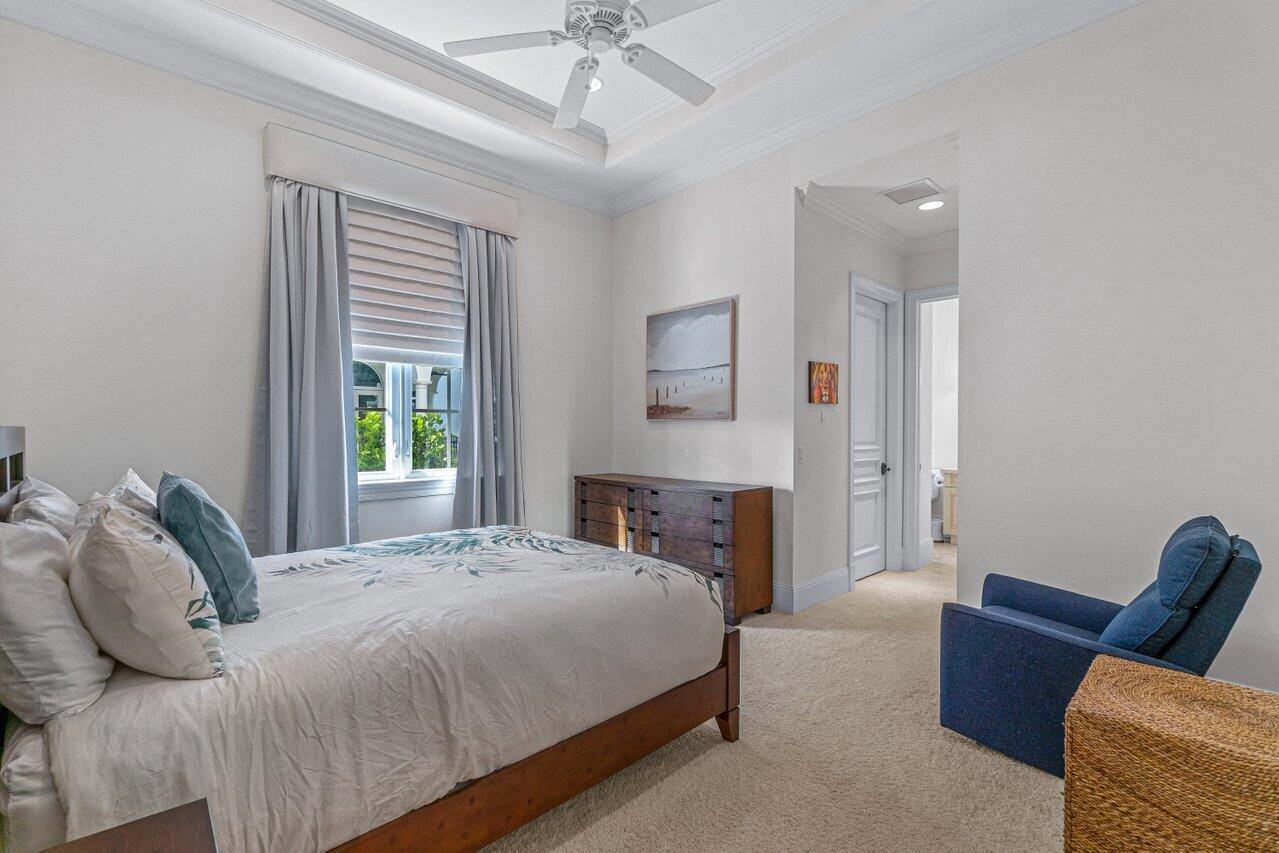 6103 North Ocean Boulevard Ocean Ridge, FL 33435 - Photo 13 of 53 a bedroom with bed and window