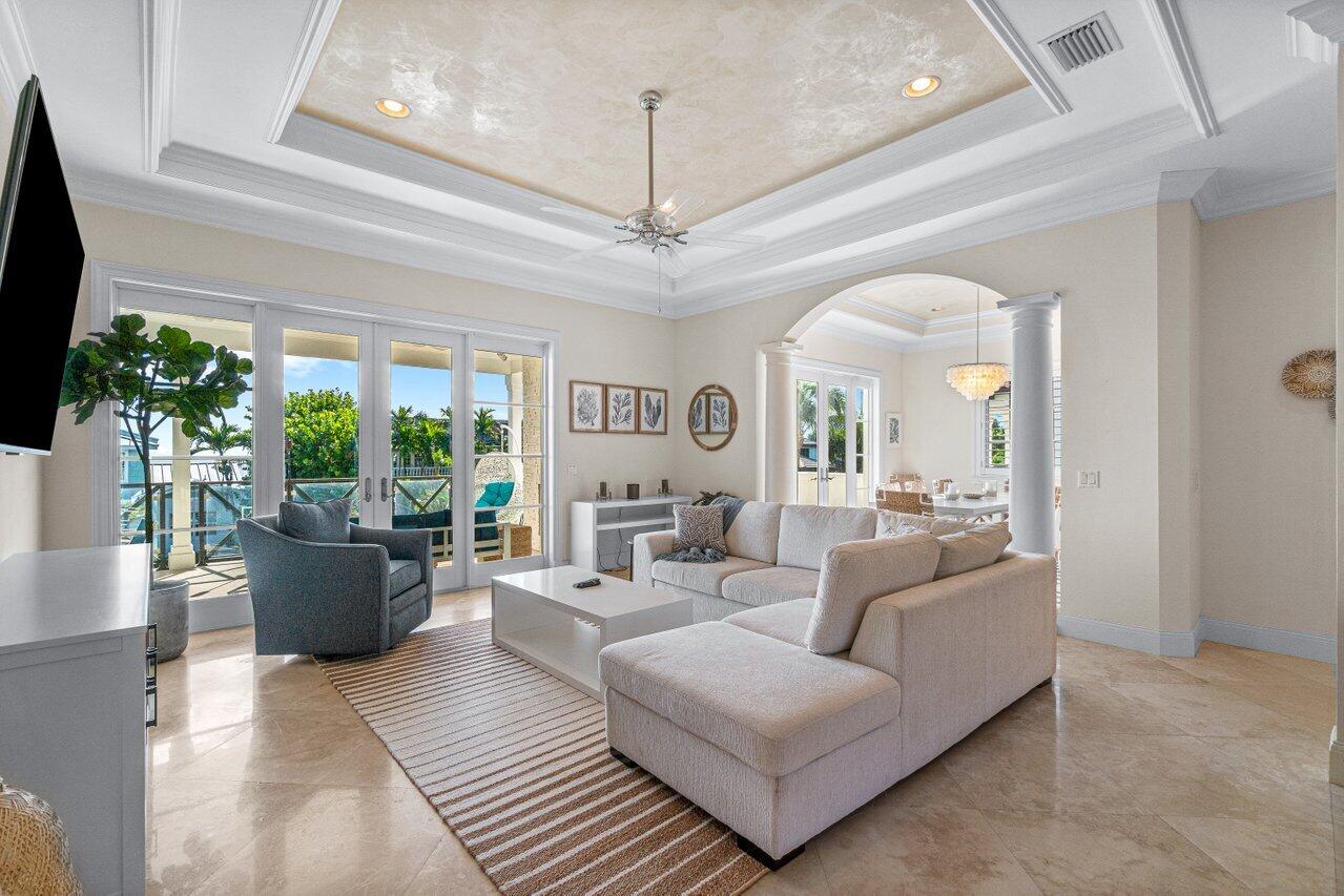6103 North Ocean Boulevard Ocean Ridge, FL 33435 - Photo 17 of 53 a living room with furniture and a large window