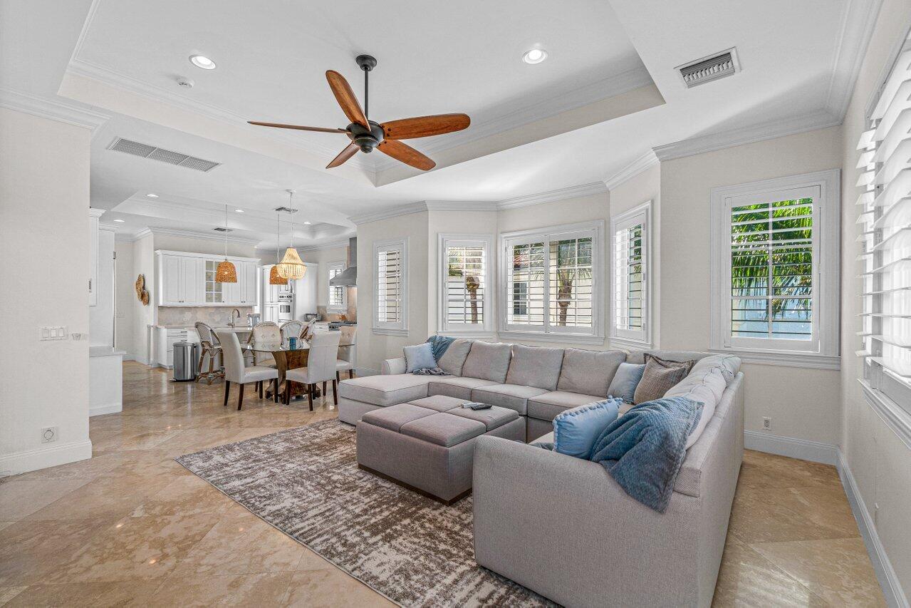 6103 North Ocean Boulevard Ocean Ridge, FL 33435 - Photo 26 of 53 a living room with furniture and a window