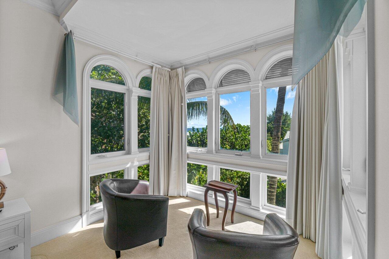 6103 North Ocean Boulevard Ocean Ridge, FL 33435 - Photo 28 of 53 a living room with furniture and a large window