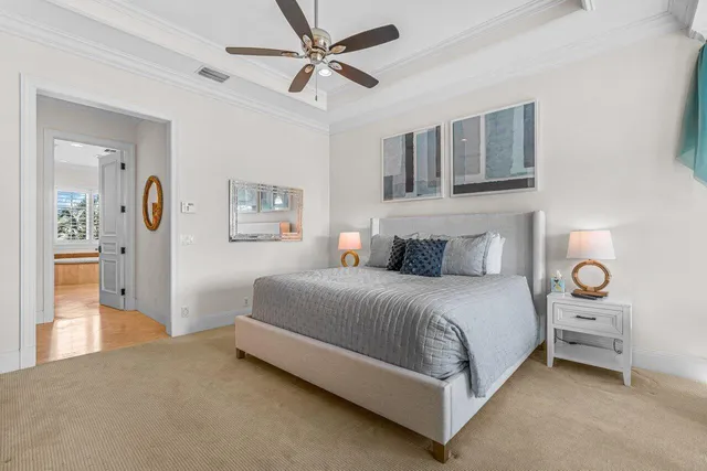 a spacious bathroom with a granite countertop sink a mirror and a shower