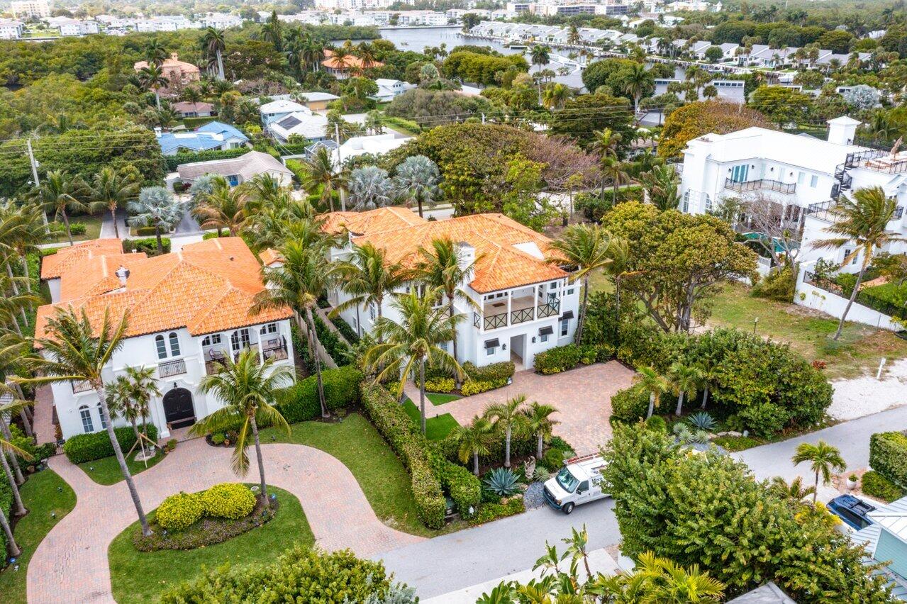 6103 North Ocean Boulevard Ocean Ridge, FL 33435 - Photo 4 of 53 an aerial view of residential houses with outdoor space and trees