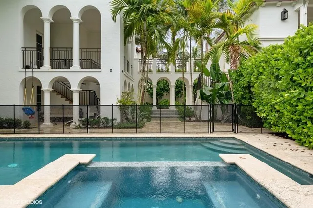 a view of a house with a swimming pool
