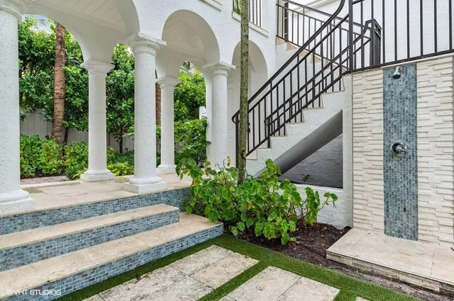 a view of a swimming pool with a balcony