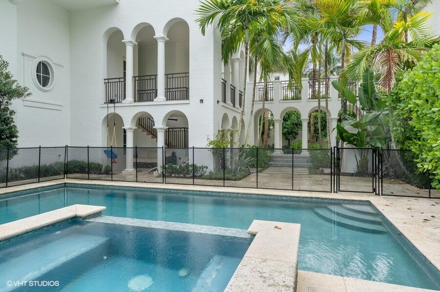 6103 North Ocean Boulevard Ocean Ridge, FL 33435 - Photo 52 of 53 a view of a house with a swimming pool