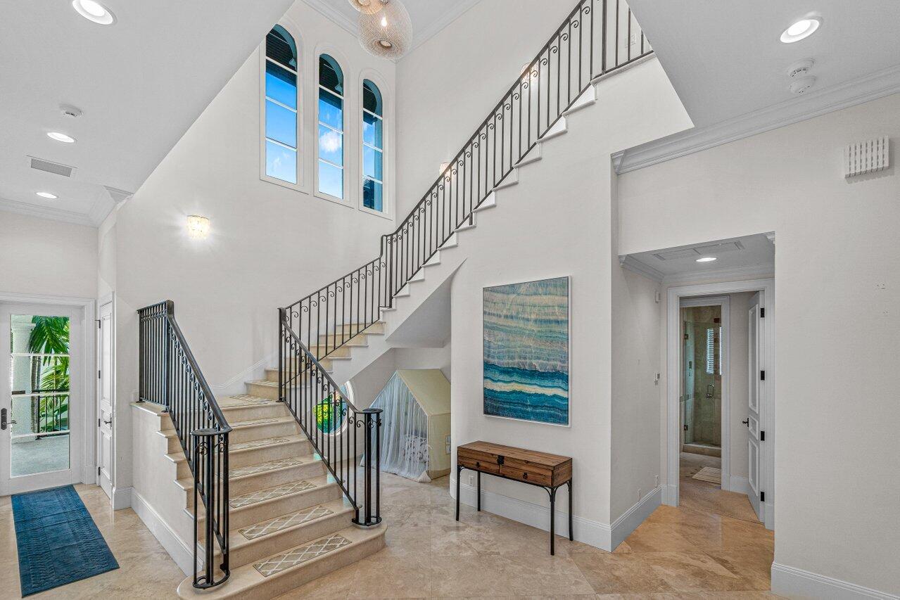 6103 North Ocean Boulevard Ocean Ridge, FL 33435 - Photo 8 of 53 a view of entryway and hall with a rug