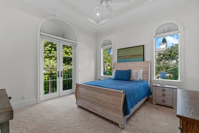 a bathroom with a double vanity sink toilet and shower