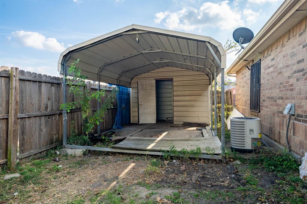 9319 Rutherglen Drive Dallas, TX 75227 - Photo 20 of 20 a front view of a house with garden