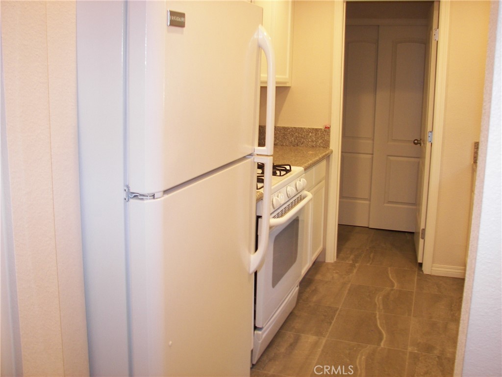 24977 Crest Forest Drive Crestline, CA 92325 - Photo 15 of 28 a utility room with dryer and washer