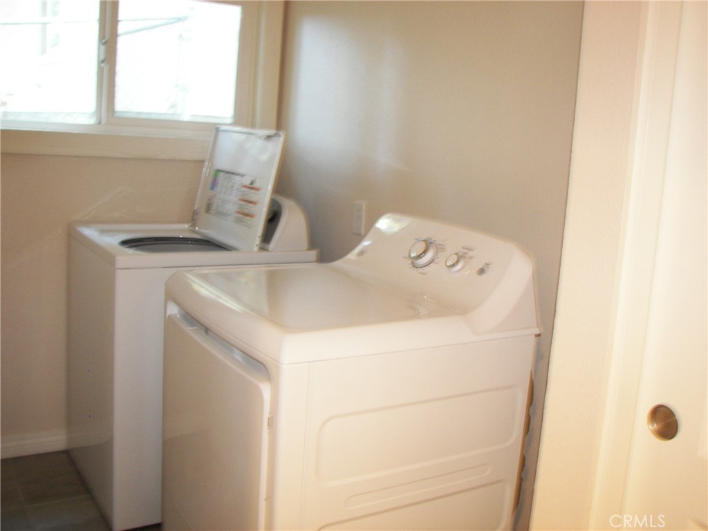 24977 Crest Forest Drive Crestline, CA 92325 - Photo 18 of 28 a utility room with dryer and washer