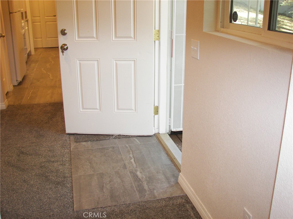 24977 Crest Forest Drive Crestline, CA 92325 - Photo 24 of 28 a view of a bathroom with wooden floor