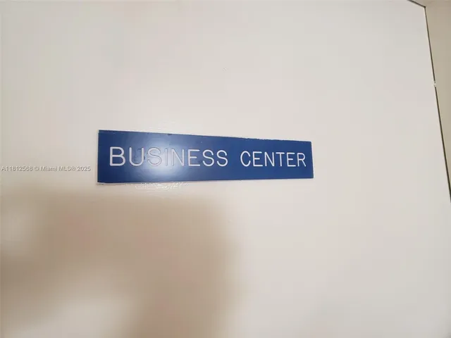 a wall with a sign on it