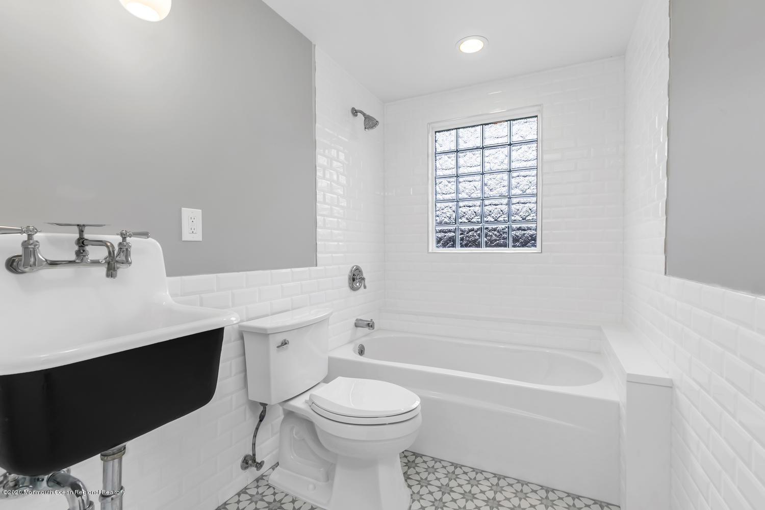 7 Hendrickson Place Fair Haven, NJ 07704 - Photo 9 of 14 a bathroom with a sink toilet vanity and bathtub