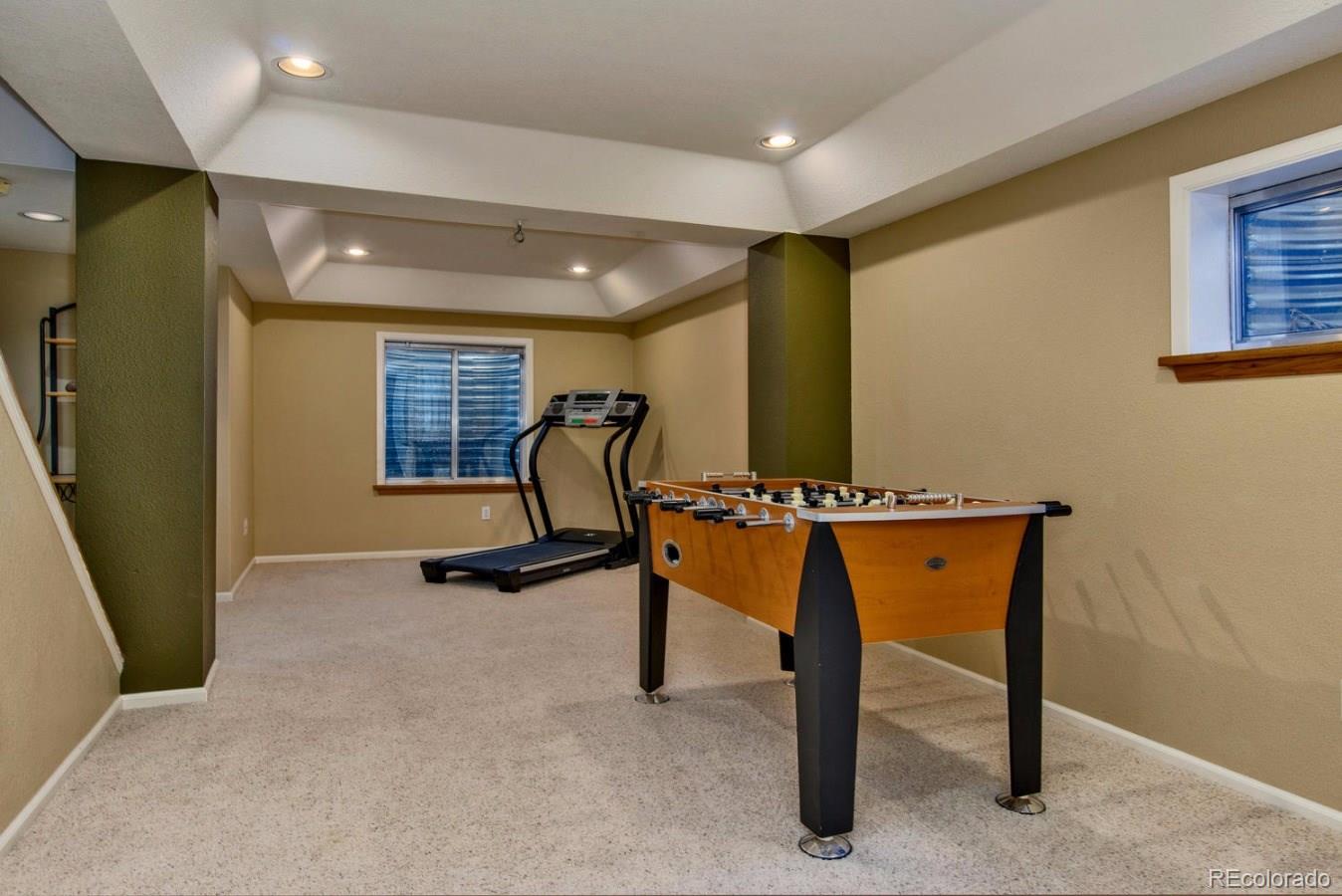 1757 Spring Water Place Highlands Ranch, CO 80129 - Photo 22 of 34 a view of a room with gym equipment