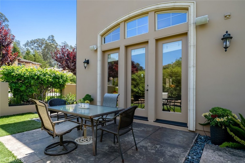 1602 Payton Way Nipomo, CA 93444 - Photo 19 of 71 a view of a patio with table and chairs and potted plants